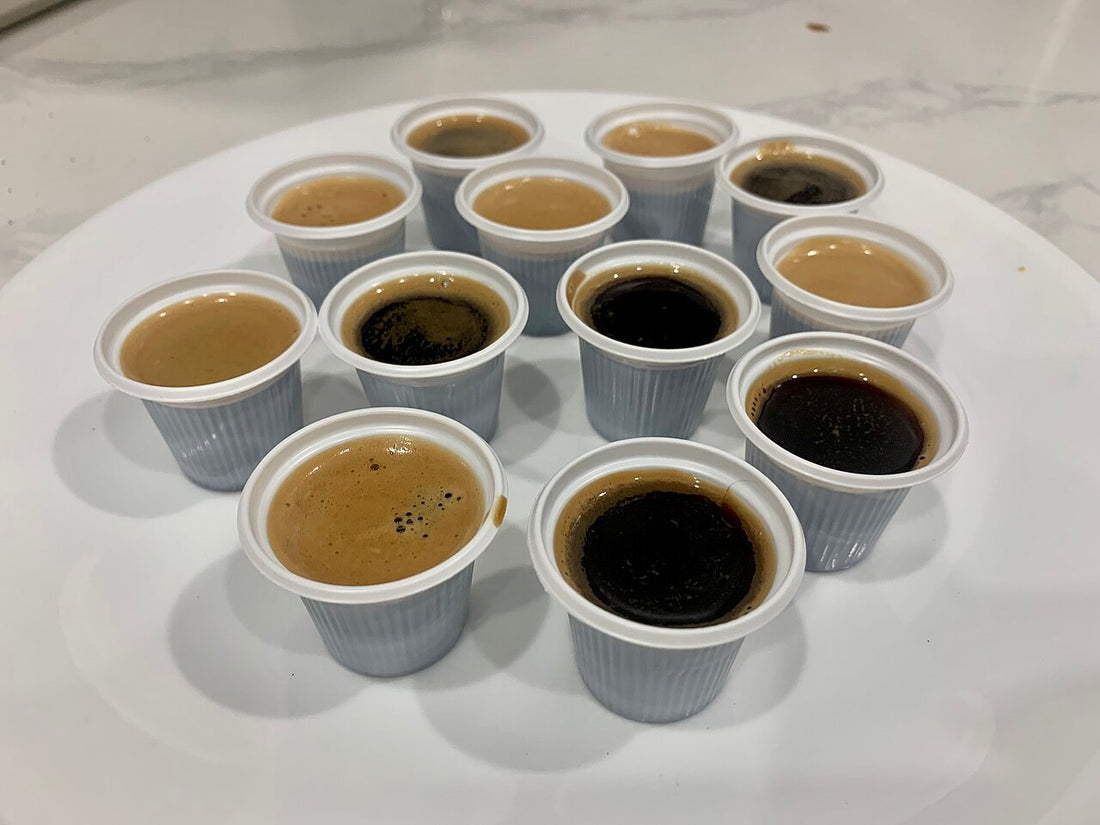 Cuban cafecito served communally with small plastic cups