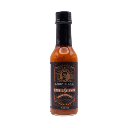 Bottle of Barbaro Mojo Best Day Ever Cuban hot sauce, front label, on a white background