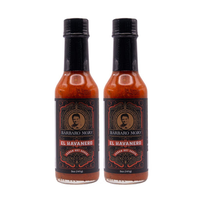 Two bottles of Barbaro Mojo El Havanero Cuban hot sauce on a white background