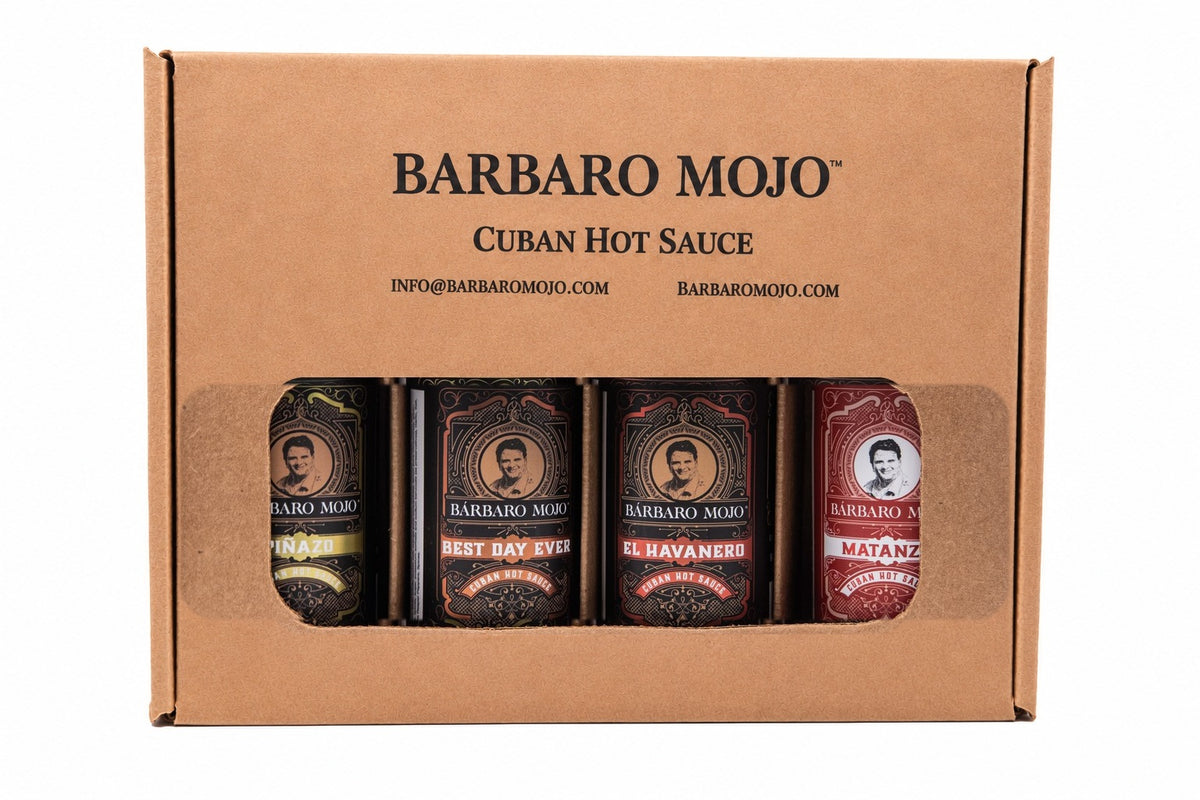 Barbaro Mojo kraft gift box with a window showing Piñazo, Best Day Ever, El Havanero and Matanza bottles