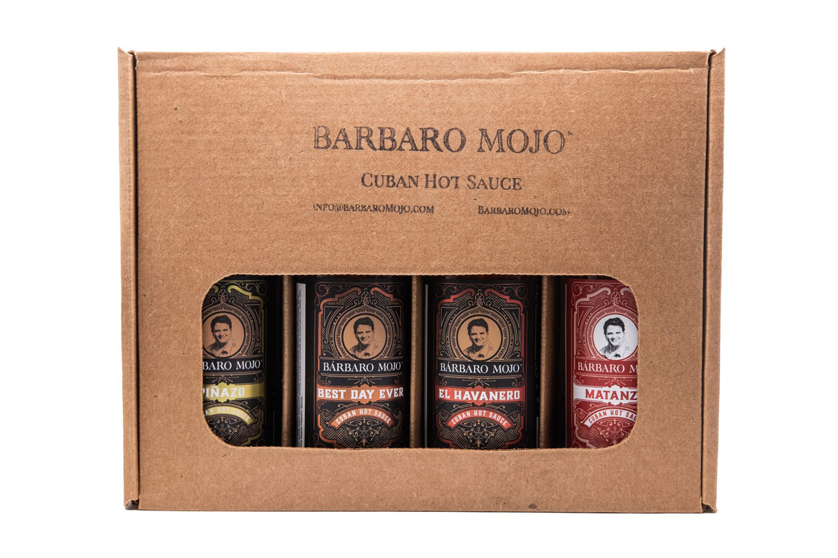 Barbaro Mojo kraft gift box with a window showing Piñazo, Best Day Ever, El Havanero and Matanza bottles