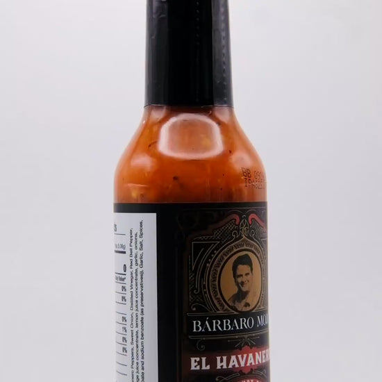 360 degree spin of a bottle of Barbaro Mojo El Havanero Cuban hot sauce with the new foil label